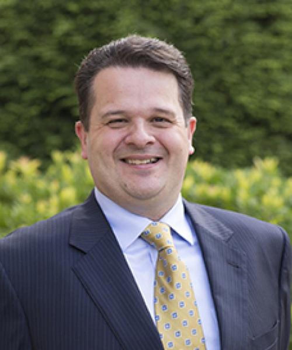 Michael J. Paquin | Trust Administrator | Woodman & Eaton